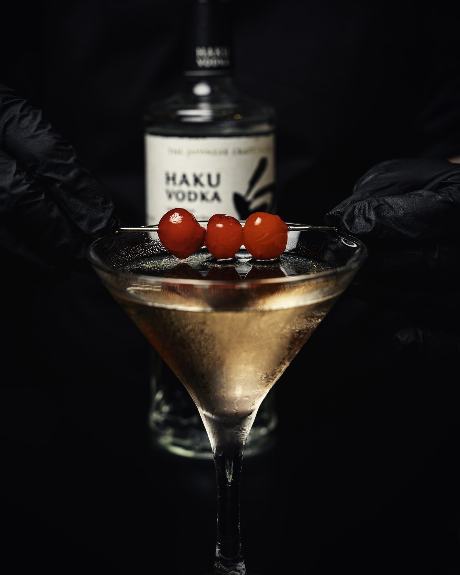 Haku vodka martini with a cherry garnish at Mina's Table
